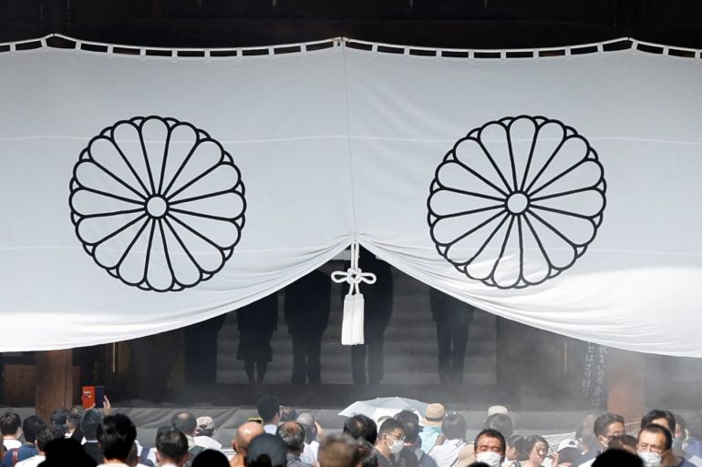 People visit at Yasukuni Shrine on the 77th anniversary of Japan's surrender in World War Two