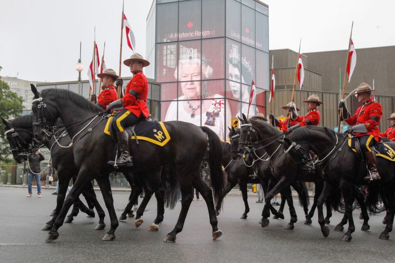 RCMP officers on horseback during a ceremony in Ottawa after the death of Queen Elizabeth II