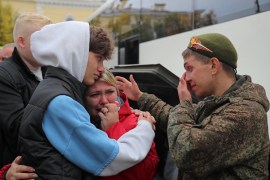 A Russian reservist bids farewell to relatives before his departure for a base in the course of partial mobilisation of troops, aimed to support the country&#39;s military campaign in Ukraine, in the town of Gatchina in Leningrad Region, Russia, on October 1, 2022 (REUTERS/Igor Russak).