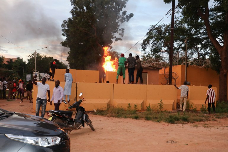 Fire is seen at the French Embassy in Ouagadougou