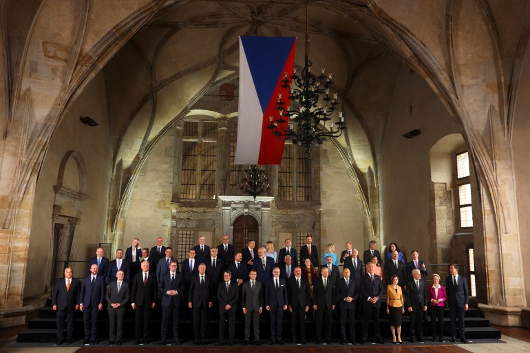 Attendees pose for a photograph at the Informal EU 27 Summit and Meeting within the European Political Community at Prague Castle in Prague, Czech Republic, October 6, 2022. REUTERS/Eva Korinkova