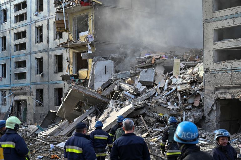 A view shows a residential building heavily damaged by a Russian missile strike.