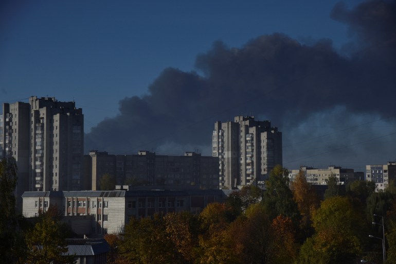 A smoke rises over the city after Russian missile strikes, amid Russia's attack on Ukraine, in Lviv,
