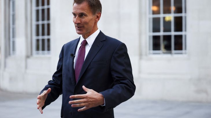 British Chancellor of the Exchequer Jeremy Hunt speaks during an interview