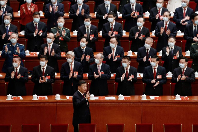 Chinese President Xi Jinping waves as he arrives for the opening ceremony of the 20th National Congress of the Communist Party of China, at the Great Hall of the People in Beijing, China October 16, 2022.