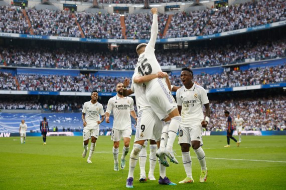 Real Madrid's Federico Valverde celebrates scoring their second goal with teammates.