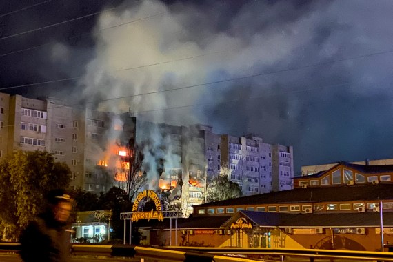 The site of a plane crash into a residential building in the southern city of Yeysk, Russia.
