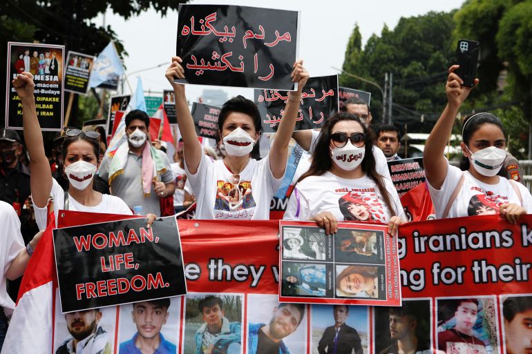 Demonstrators take part in a protest against the Iranian regime.