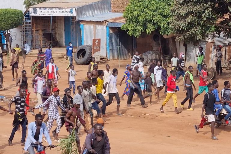 People walk as they protest in Moundou, Chad, October 20, 2022 in this picture obtained from social media. Hyacinthe Ndolenodji/via REUTERS THIS IMAGE HAS BEEN SUPPLIED BY A THIRD PARTY. MANDATORY CREDIT. NO RESALES. NO ARCHIVES.