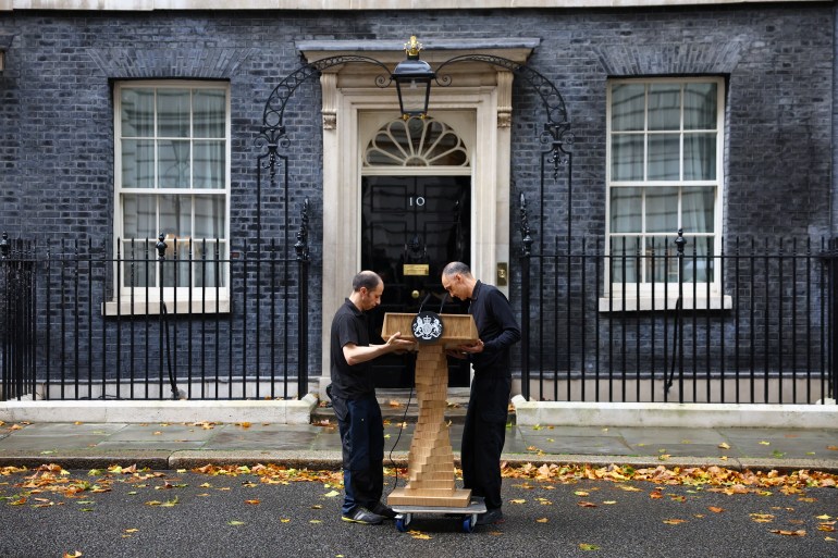 A podium is brought outside Number 10 Downing Street, London