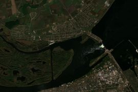 A satellite image shows a view of the location of the Nova Kakhovka dam and the surrounding region in Kherson Oblast