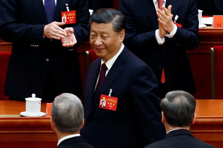 Chinese President Xi Jinping leaves at the end of the closing ceremony of the 20th National Congress of the Communist Party of China, at the Great Hall of the People in Beijing, China