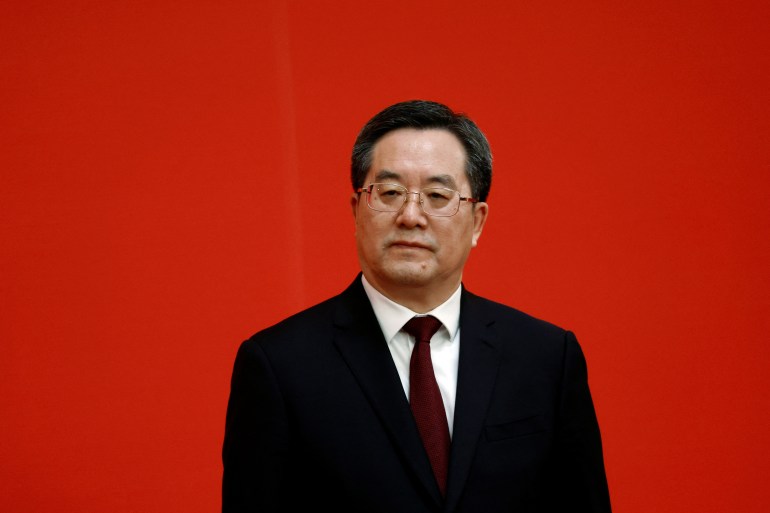 New Politburo Standing Committee member Ding Xuexiang meets the media after the 20th National Congress of the Communist Party of China