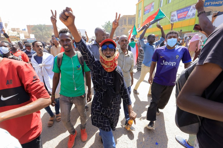 Protesters march during a rally against military rule following the last coup, in Khartoum, Sudan, October 25, 2022