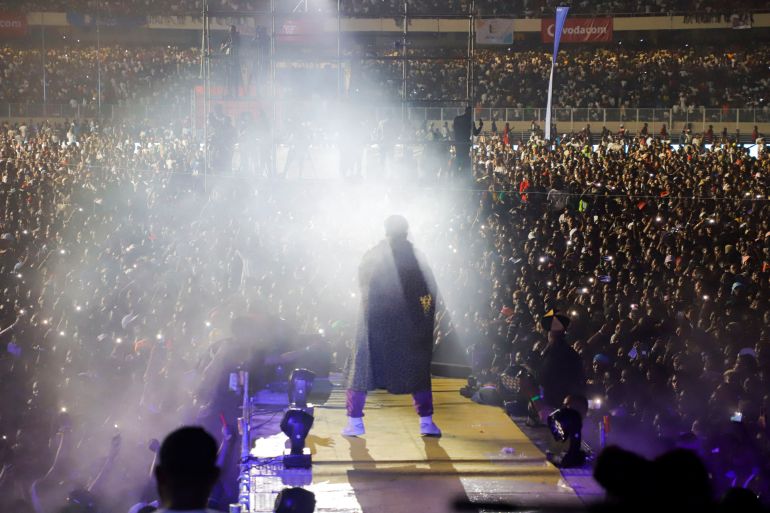 Congolese singer Fally Ipupa performs during his concert at the overcrowded Martyrs stadium in Kinshasa, Democratic Republic of Congo