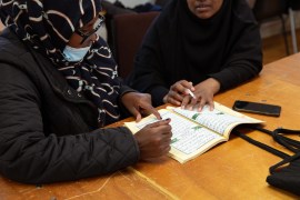 Women learning to read the Quran.