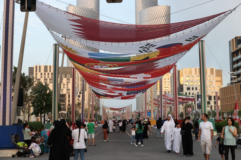 Country flags are seen on a street in Lusail, Qatar.