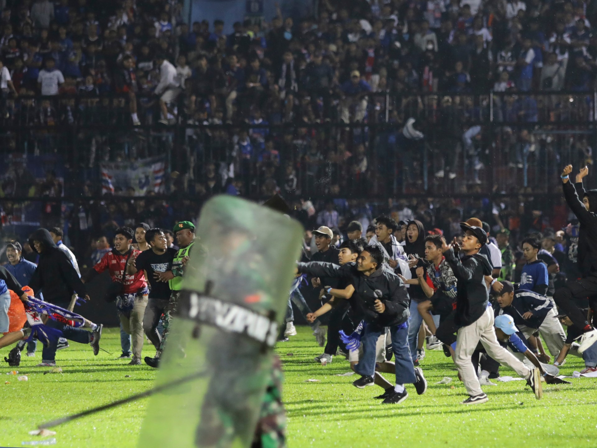 How did Indonesia’s deadly football stampede unfold?