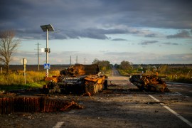 The remains of a destroyed Russian tank are scattered on the ground along the road between Izyum and Kharkiv, Ukraine [Francisco Seco/AP Photo]