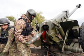 Ukrainian soldiers prepare artillery fire on the front line in the Kharkiv region, Ukraine [Andrii Marienko/AP Photo]