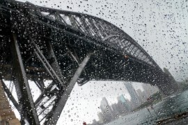 Sydney was deluged with rain on Thursday with more downpours forecast [Mark Baker/AP Photo]