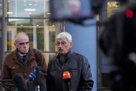 Oleg Orlov, a member of the Board of the International Historical Educational Charitable and Human Rights Society 'Memorial' (International Memorial), right, and Jan Rachinsky, Chairman of the Board of the International "Memorial", speak to media after a court hearing in Moscow, Russia, Friday, Oct. 7, 2022. On Friday, Oct. 7, 2022 the Nobel Peace Prize was awarded to jailed Belarus rights activist Ales Bialiatski, the Russian group Memorial and the Ukrainian organization Center for Civil Liberties. (AP Photo/Alexander Zemlianichenko)