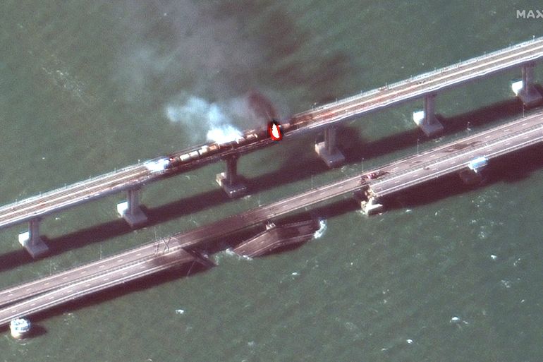 This satellite image provided by Maxar Technologies shows damage to the Kerch Bridge