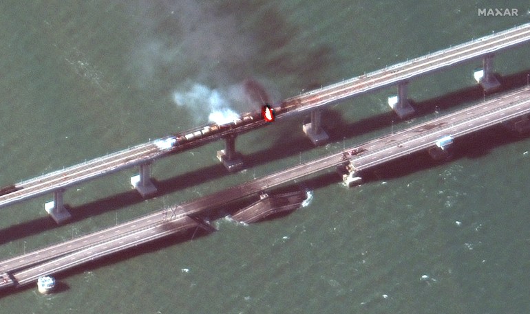 This satellite image provided by Maxar Technologies shows damage to the Kerch Bridge