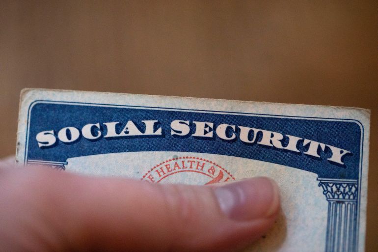 A Social Security card is displayed