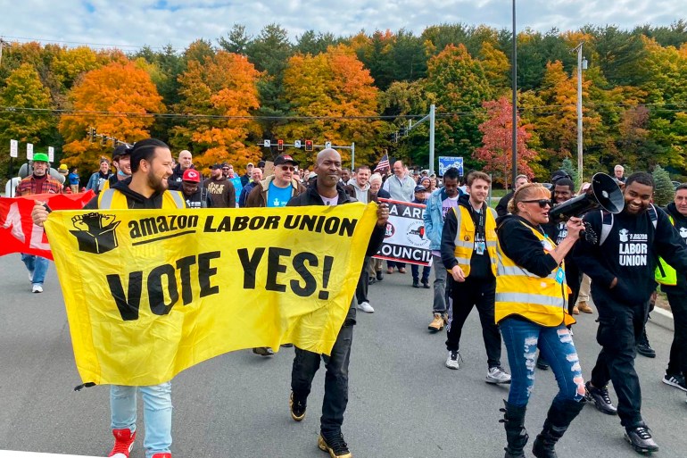 Amazon workers and supporters march during a rally in Castleton-On-Hudson in New York state, the US.