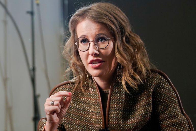 FILE - Russian TV host Ksenia Sobchak speaks about her campaign to challenge Vladimir Putin in the March 18 presidential election, during an interview to the Associated Press in Moscow, Russia, Thursday, Feb. 1, 2018. Russian investigators on Wednesday, Oct. 26, 2022, raided the home of Ksenia Sobchak, the glamourous daughter of Russian President Vladimir Putin's one-time boss, in a move that has sent shockwaves through the country's political scene. (AP Photo/Alexander Zemlianichenko,