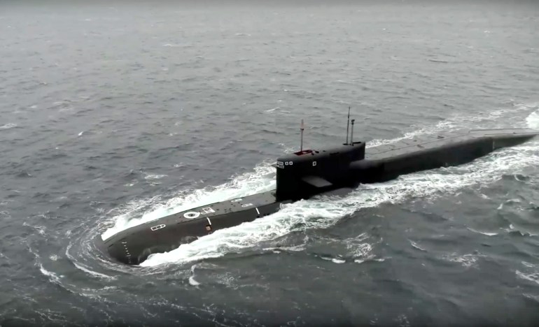 In this handout photo taken from video released by Russian Defense Ministry Press Service on Wednesday, Oct. 26, 2022, the Tula nuclear submarine of the Russian navy is on a mission to conduct a practice launch of an intercontinental ballistic missile as part of drills of the country's nuclear forces. Russian President Vladimir Putin has monitored drills of the country's strategic nuclear forces involving multiple practice launches of ballistic and cruise missiles. The Kremlin said in a statement that all the test-fired missiles reached their designated targets. (Russian Defense Ministry Press Service via AP)
