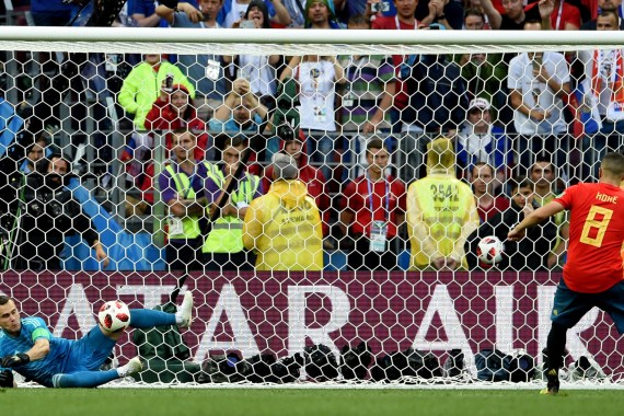 Russia's Igor Akinfeev saves Koke's penalty