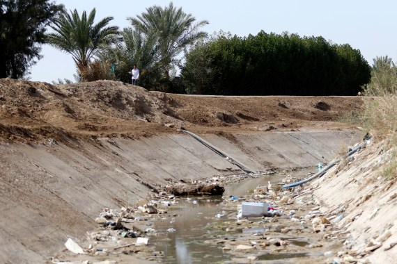 A picture taken on March 20, 2018 shows a dried-up irrigation dyke in Sayyed Dakhil village, to the east of Nasiriya city some 300km south of Baghdad, Iraq