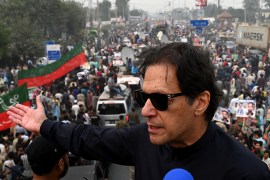 In this photograph taken on November 1, 2022, Pakistan's former prime minister Imran Khan speaks while taking part in an anti-government march in Gujranwala. - Khan was shot in the foot at a political rally on November 3, 2022 but he is in a stable condition, an aide said.