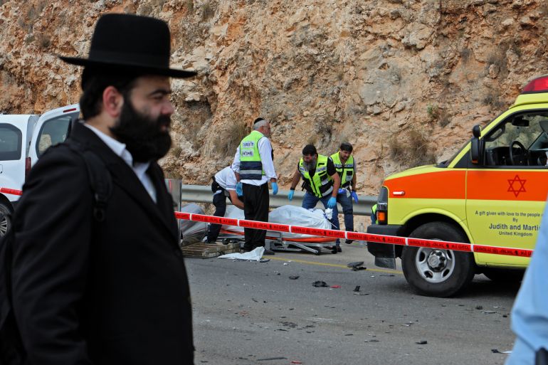 Israeli forensic check the scene of an attack in the Ariel Industrial Zone in the occupied West Bank