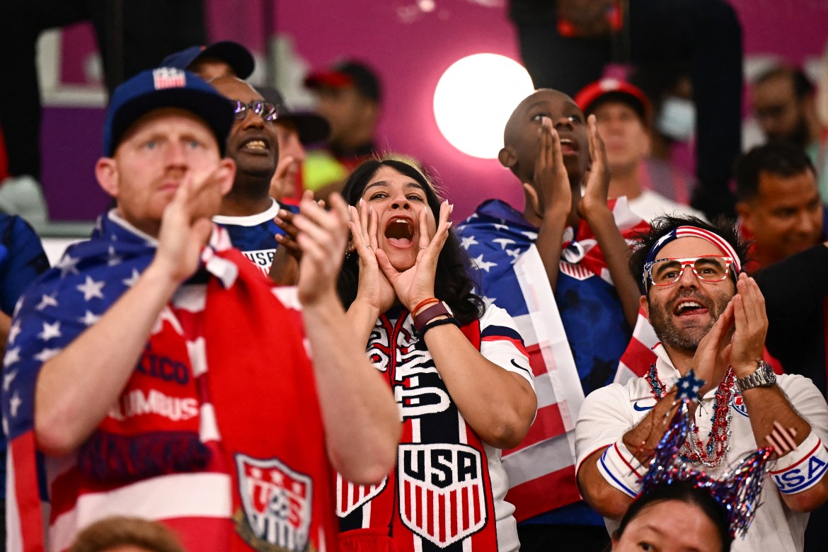 USA supporters cheer.