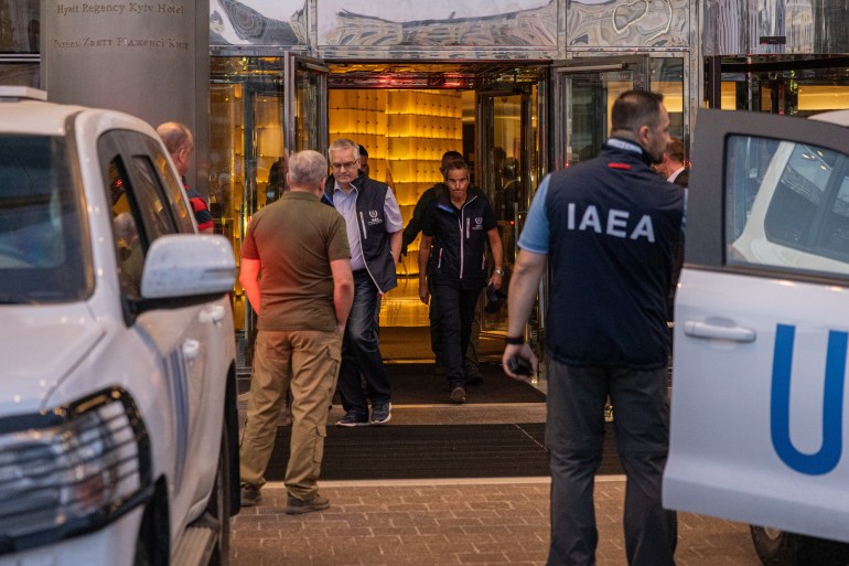 IAEA members depart from a hotel in Kyiv