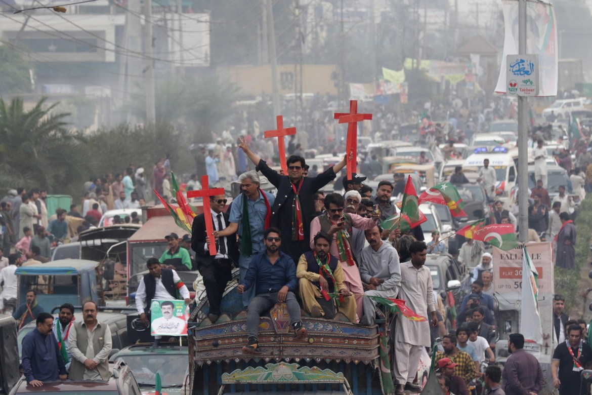 Supporters of Imran Khan join a protest march towards Islamabad