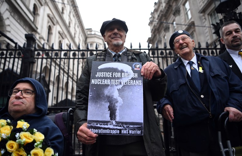 Nuclear test veterans and their families protest outside Downing Street in London