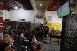 epa10320548 Yemeni soccer fans react as they watch a live broadcast of the FIFA World Cup Qatar 2022 group C soccer match between Argentina and Saudi Arabia, inside a paid-entry shop in Sana'a, Yemen, 22 November 2022.