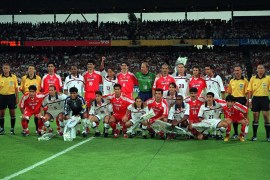 The United States and Iran football teams pose for a photo before their game in the 1998 World Cup in France [File: Darren Walsh/Action Images]