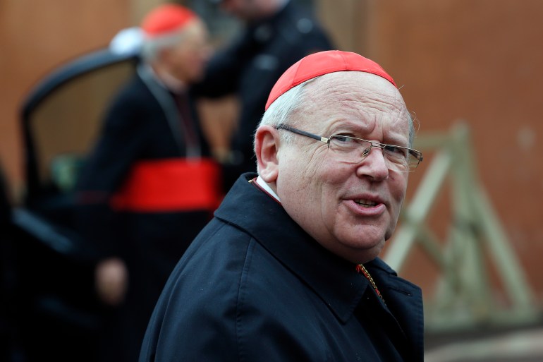 French Cardinal Jean Pierre Bernard Ricard arrives at a meeting at the Synod Hall in the Vatican