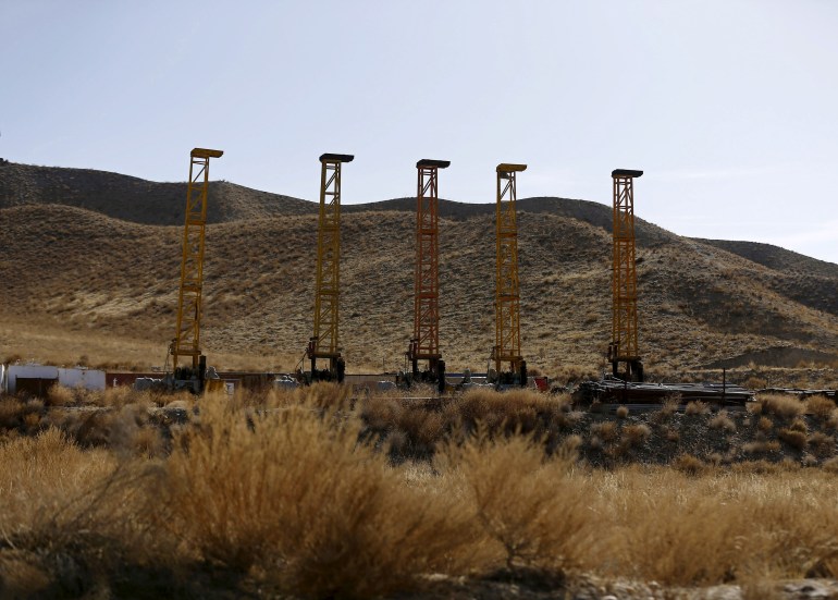 Equipment and machinery installed by Chinese excavators are seen near a copper mine in Mes Aynak, Logar province, February 14, 2015. China and Afghanistan remain deadlocked over a $3 billion copper mine la was stalled five months after Beijing demanded that royalties be nearly halved, highlighting Kabul is struggling to support itself as foreign aid dries up.  Copper, located beneath the ancient Buddhist ruins of Mes Aynak, is one of the world's largest untapped mines.  But the project has been delayed since the state-run Metallurgical Corporation of China (MCC) won the contract to develop it in 2007. The rising Taliban insurgency has tightened control of the surrounding area. around Aynak, and after threats, missile attacks and landmine threats, the MCC withdrew Chinese workers from its heavily guarded copper mining camp last year.  And then there are the Buddhist ruins.  Archaeological work to preserve treasures from ruined monasteries and stupas is dangerous and slow, and must be completed before mining can begin.  Photo taken February 14, 2015. REUTERS/Omar Sobhani