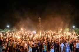 White nationalists participate in a torch-lit march on the grounds of the University of Virginia ahead of the Unite the Right Rally in Charlottesville, Virginia on August 11, 2017 [File: Reuters/Stephanie Keith]