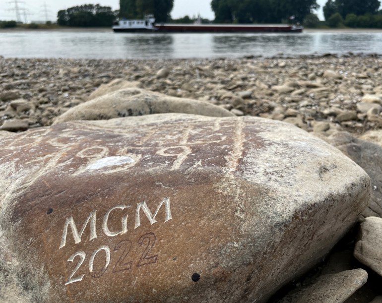 A hunger stone in a river in Rheindorf, Germany.