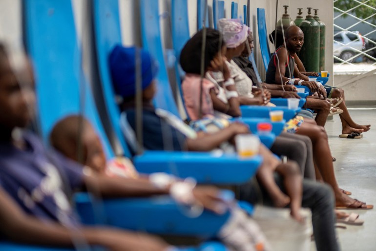 Patients receive treatment for cholera at the Gheskio Center Hospital