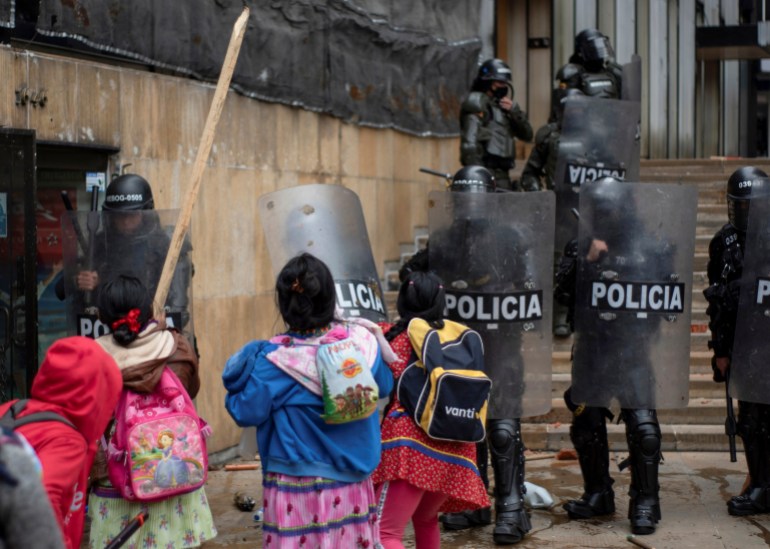 Embera people clash with violent police.