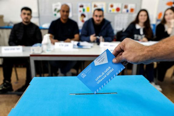An Israeli man casting his ballot on the day of Israel's general election in a polling station in Rahat, Israel.