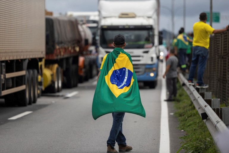 Bolsonaro supporters block a roadway in Brazil
